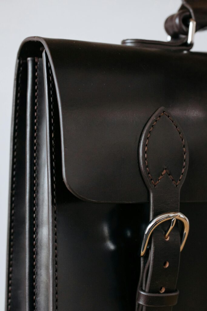 A Brown Leather Briefcase with a Stainless Buckle