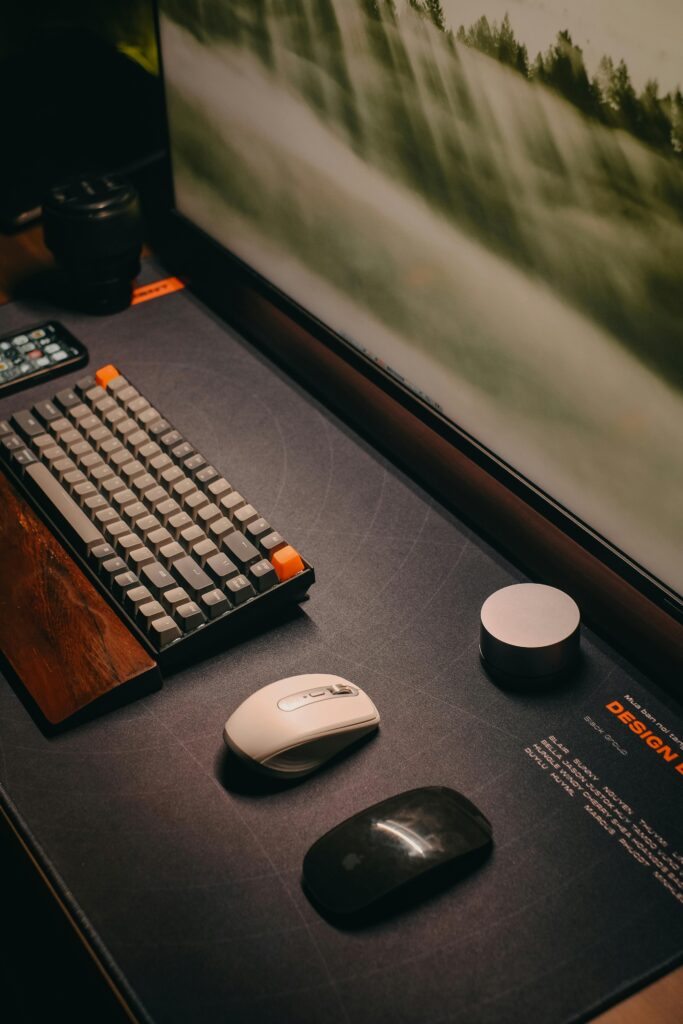 Computer Mouse and a Keyboard on a Mouse Pad